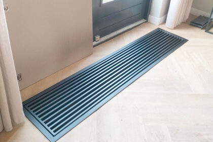 Stalen rooster voor verwarmingsput laten lassen